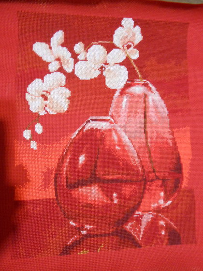 Работа «Орхидеи на красном»