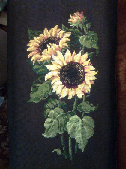 Работа «Подсолнухи на черном»