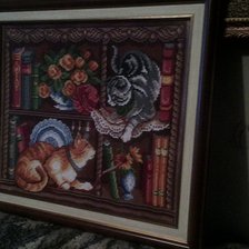 Работа «Коты на книжной полке»