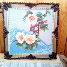 Работа «Птичка на цветущей ветке,на фоне гор.»