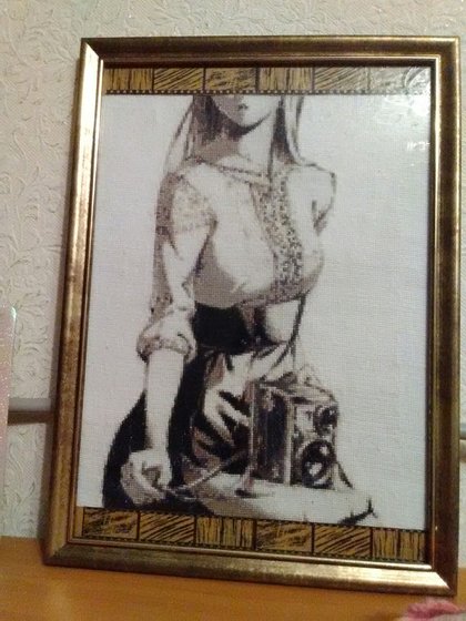 Работа «Девушка и фотоаппарат»