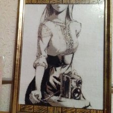 Работа «Девушка и фотоаппарат»