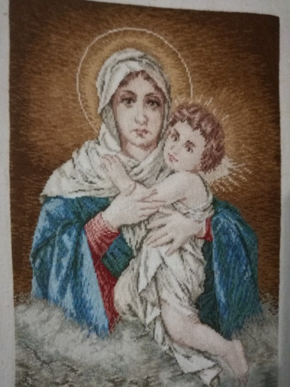 Работа «Мадонна с младенцем»