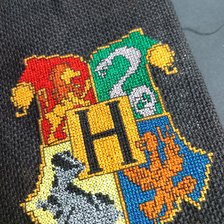 Работа «Обложка герб Хогвартса»