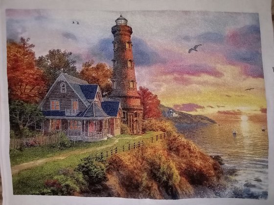 Работа «Маяк на закате»