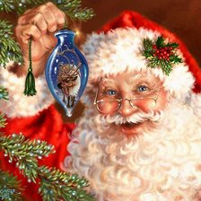 Схема вышивки «санта клаус с новогодней игрушкой»