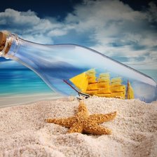 бутылка на песке