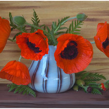 маки в вазе