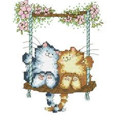 Котята на качелях