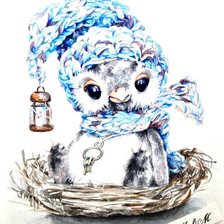 Совенок в гнезде