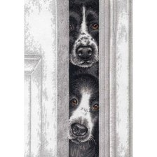 dogs peeking thourgh door